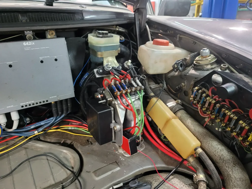 Fuse panel and wiring in the front trunk of a classic Porsche