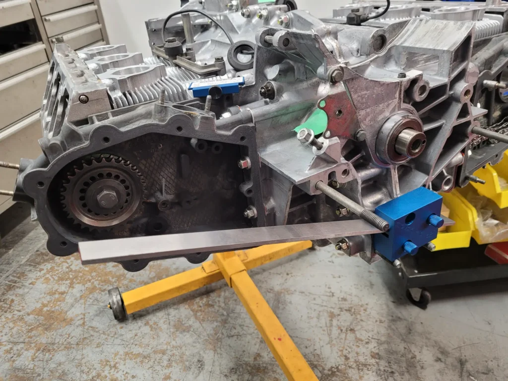 Flat-six engine case on a stand during a teardown