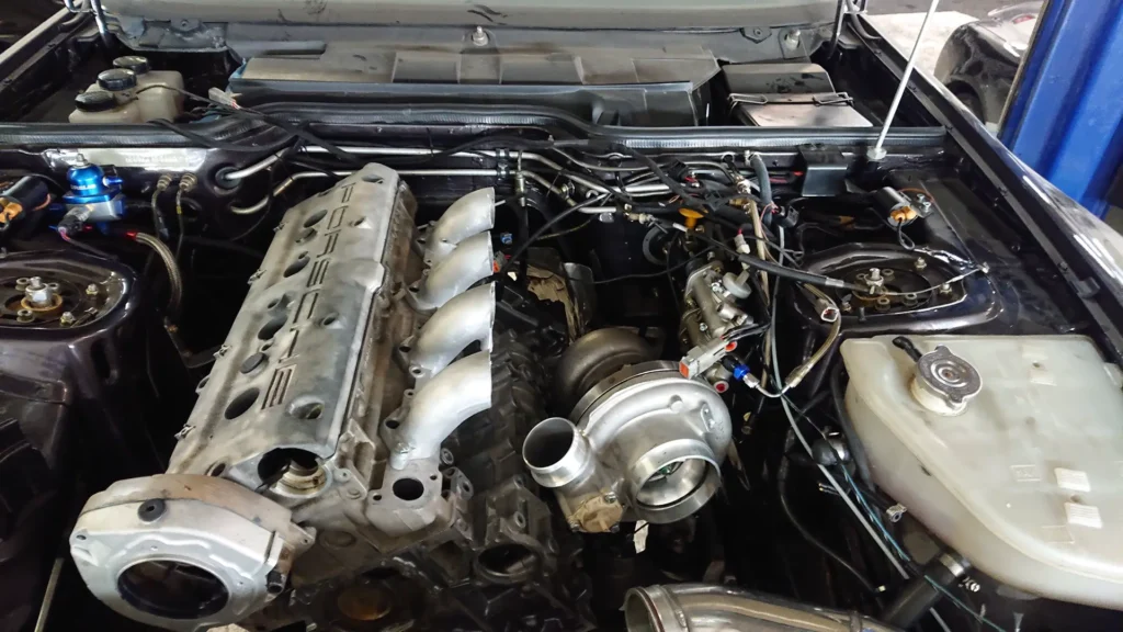 Turbocharged inline-six engine in an engine bay