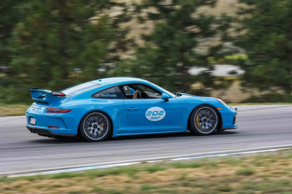 Blue Porsche 911 GT3 on track